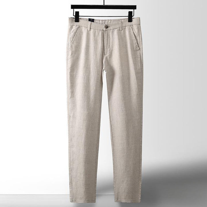 Man wearing comfortable men's lightweight linen trousers, showcasing their effortless style and breathable summer comfort.
