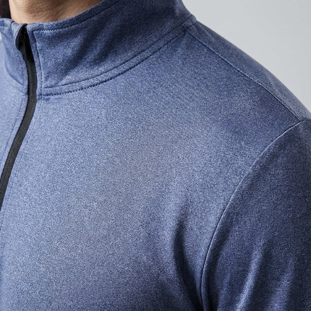 Man running outdoors wearing a lightweight, quick-dry men's long sleeve sports top in black