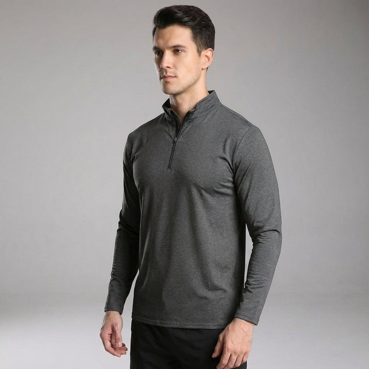 Stack of folded men's quick-dry polyester blend long sleeve sports shirts in various colors