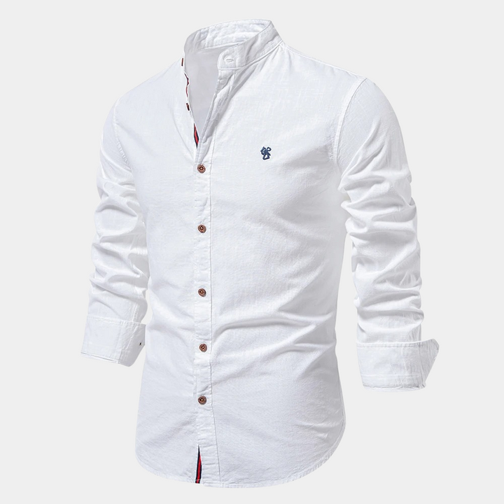Stylish man wearing a versatile slim fit long-sleeve summer shirt, great for smart casual men's fashion.