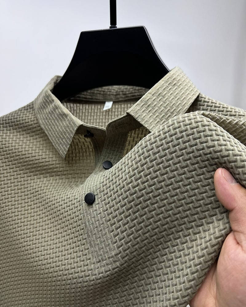 Back view of a wrinkle-resistant Matteo men's polo shirt, showcasing its sleek design & lightweight fabric.
