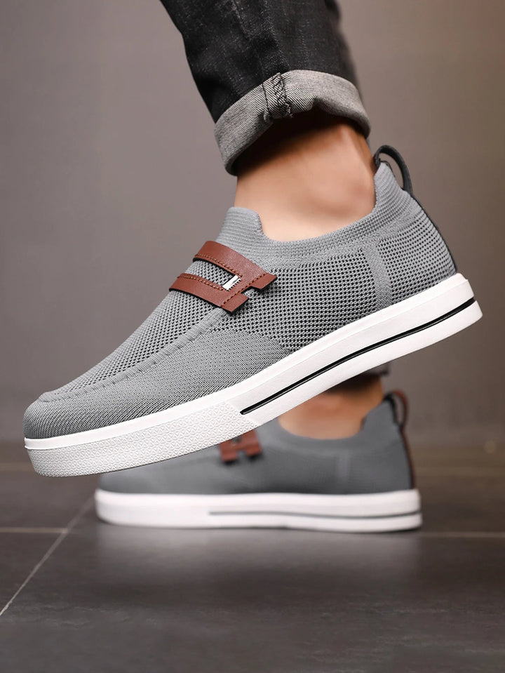 Casual men's slip-on loafers with breathable mesh, ideal lightweight footwear for summer essentials.
