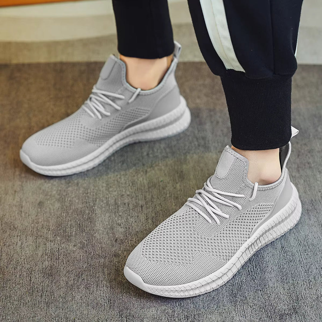 Modern men's lightweight mesh performance sneakers for running, walking, and daily activity.