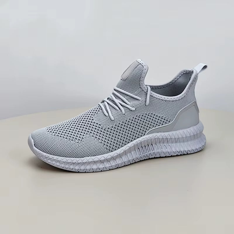 Ergonomic men's mesh daily wear sneakers, lightweight & breathable for optimal comfort.