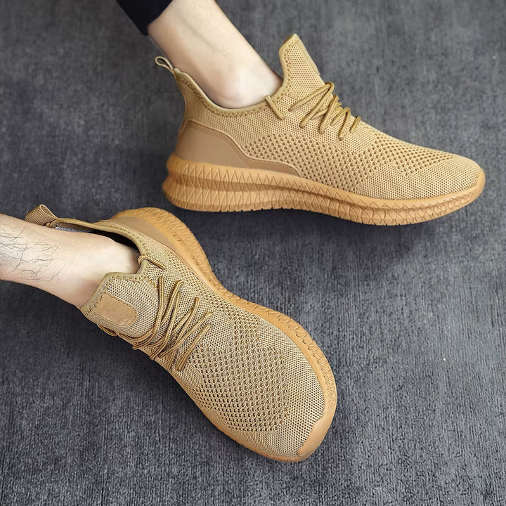 Performance men's sneakers, lightweight & breathable, great for active daily wear.