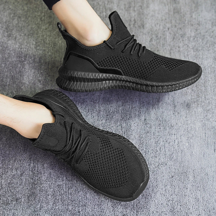 Comfortable men's athletic footwear, breathable mesh for daily wear & performance.