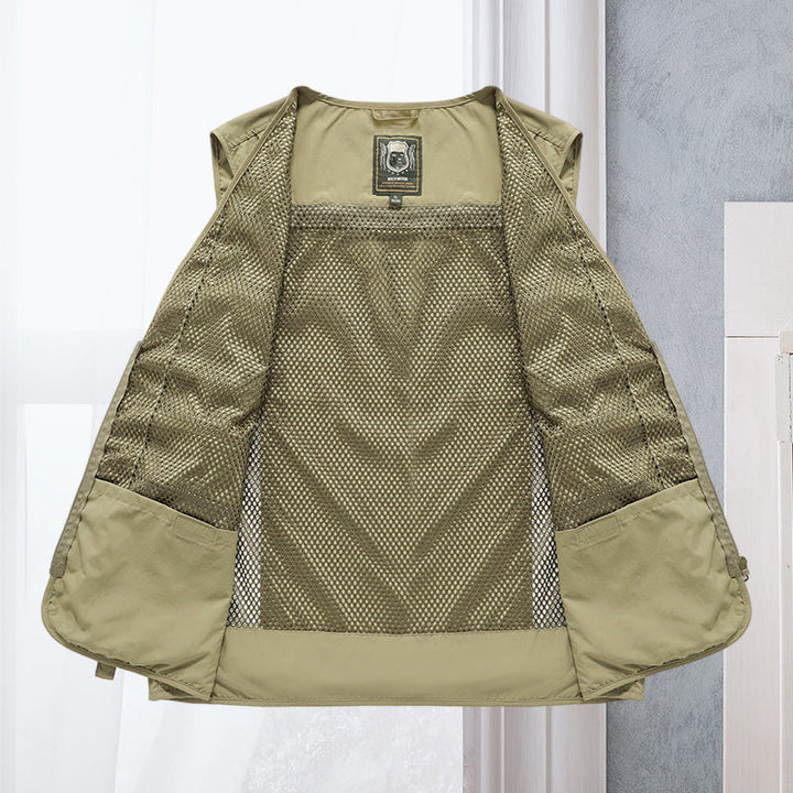 Men's travel vest, lightweight & multi-pocket for outdoor exploration.