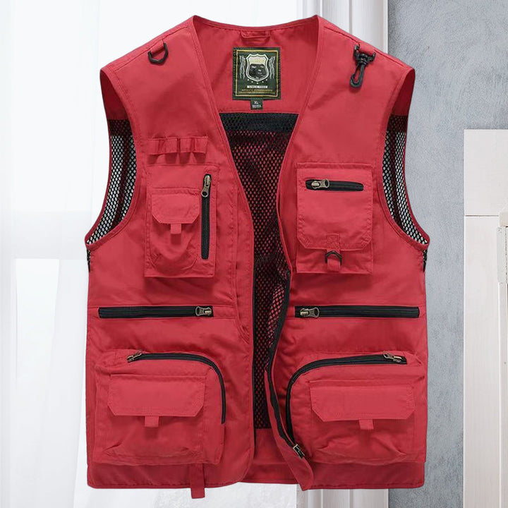 Close-up of lightweight men's outdoor utility vest pockets for gear storage.