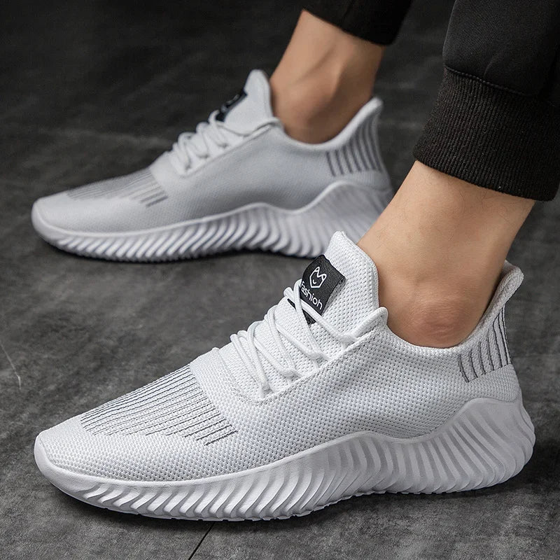 Men's lightweight performance running shoes in a sleek design, perfect for daily training & active wear.
