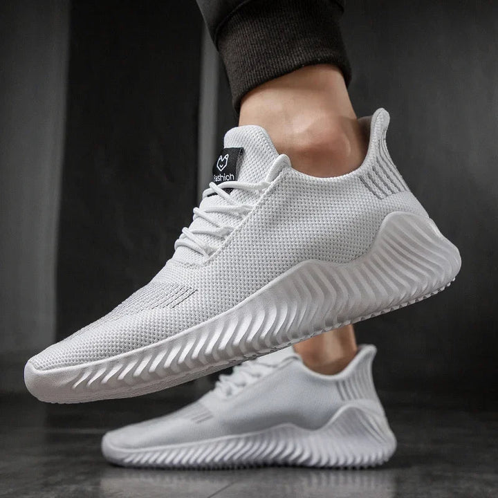 Comfortable men's athletic trainers, ideal for running, gym workouts, and everyday casual wear.