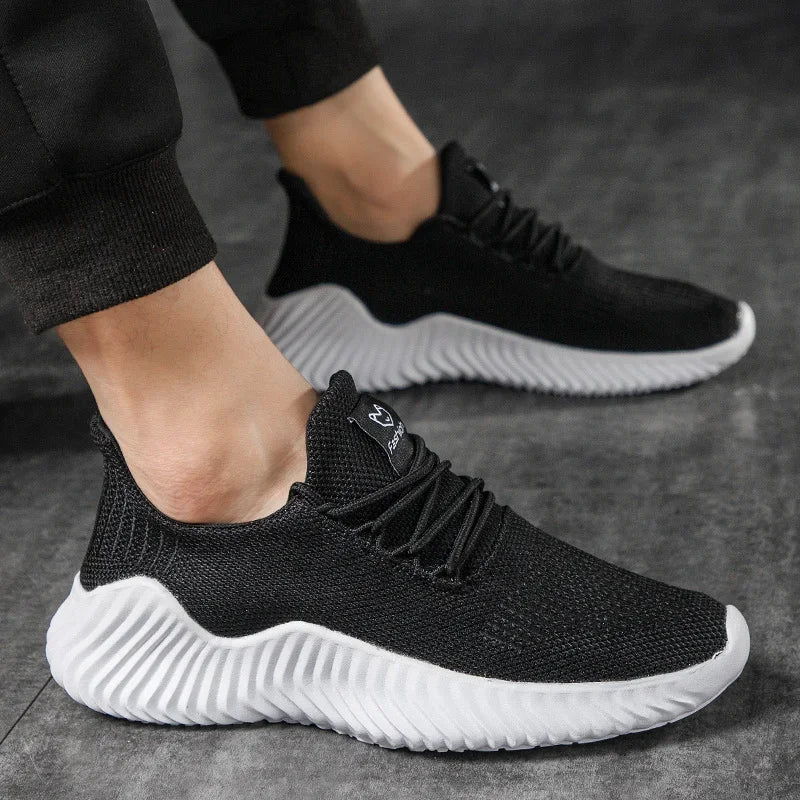 Modern men's athletic sneakers, offering a lightweight feel and responsive cushioning for runners.