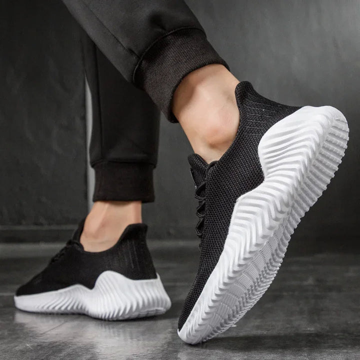 High-performance men's running sneakers, engineered for lightweight agility and long-lasting comfort.