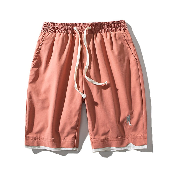 Dante men's quick-dry athletic shorts in black, ideal for beachwear or casual summer outings.