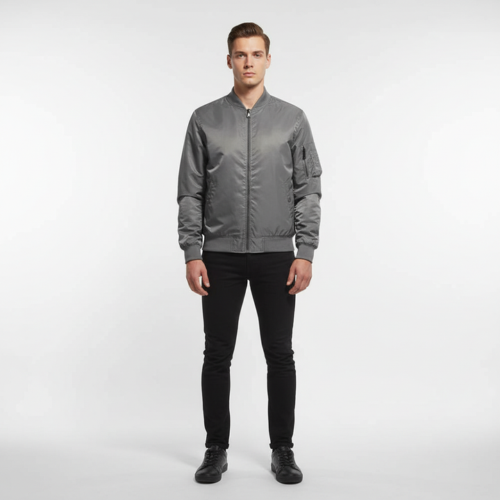 Back view of the Lothar men's bomber jacket, highlighting its lightweight and transitional design.