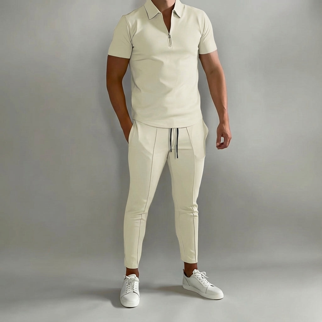 Men's athletic polyester tracksuit in black, designed for training and comfortable spring outdoor activity.