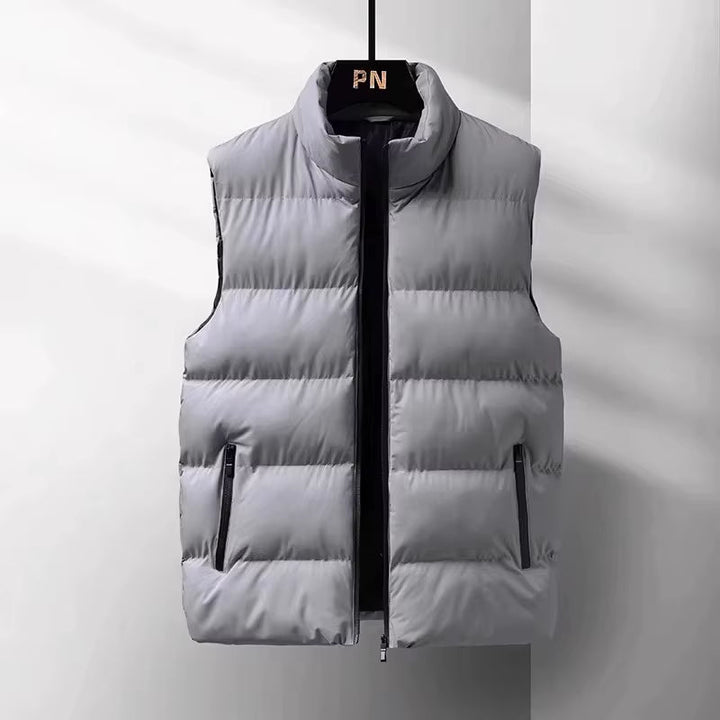Stylish men's lightweight puffer vest with quilted design, ideal for active outdoor adventures & everyday casual wear.