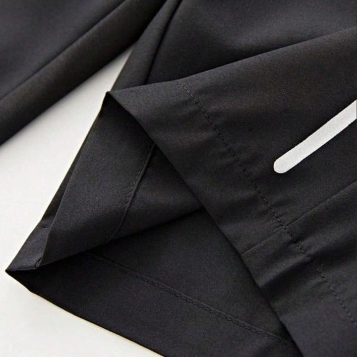 Men's lightweight performance shorts with deep zipper pockets, essential for secure storage during activity.