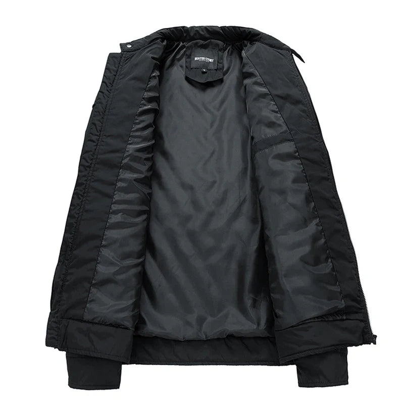 Stylish men's lightweight quilted jacket, snap collar, zipper pockets. Perfect for everyday wear.