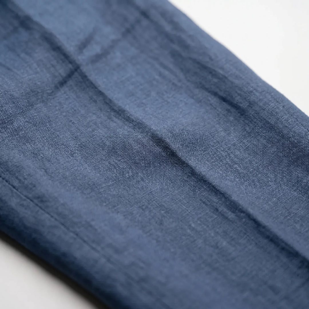 Comfortable men's lightweight summer trousers with a relaxed fit, featuring a mid-rise & button fly.