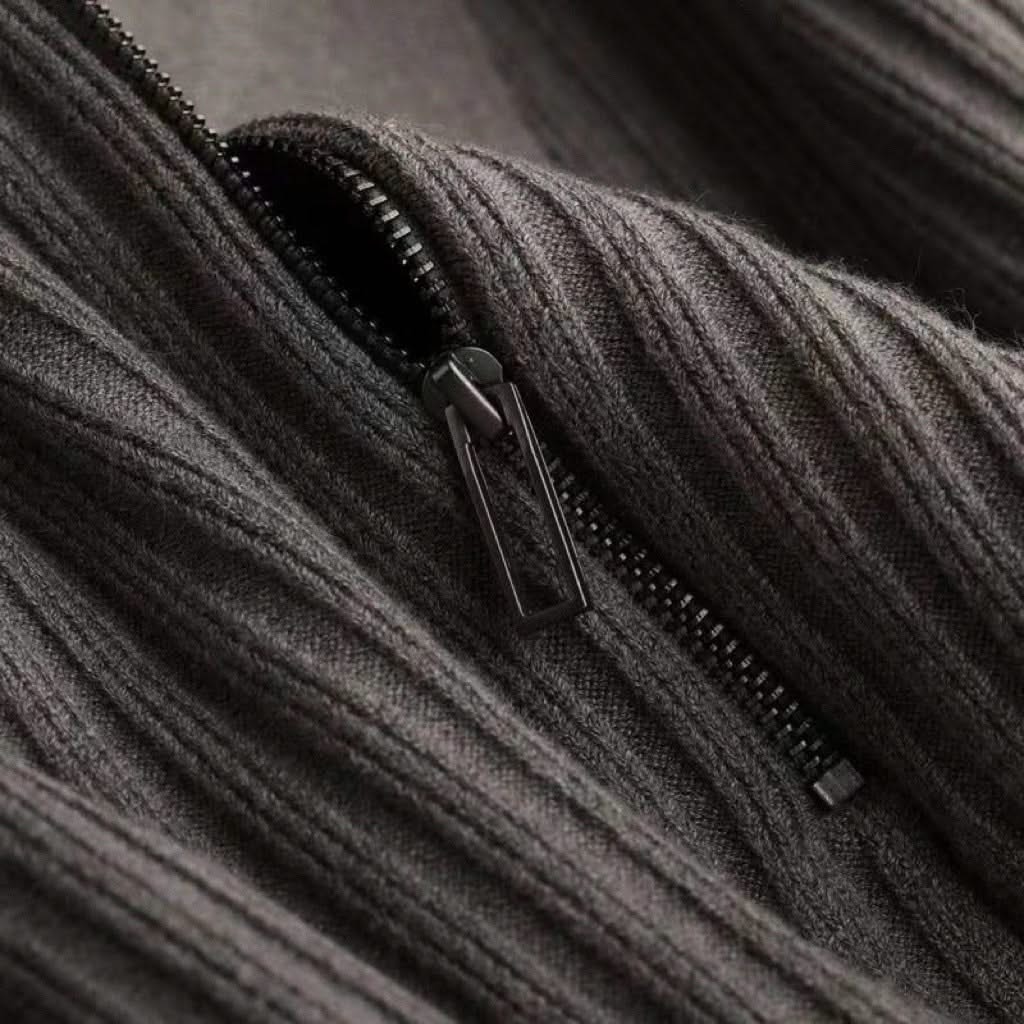 Men's ribbed knit polo shirt in a soft, lightweight cotton blend, tailored for a flattering fit.