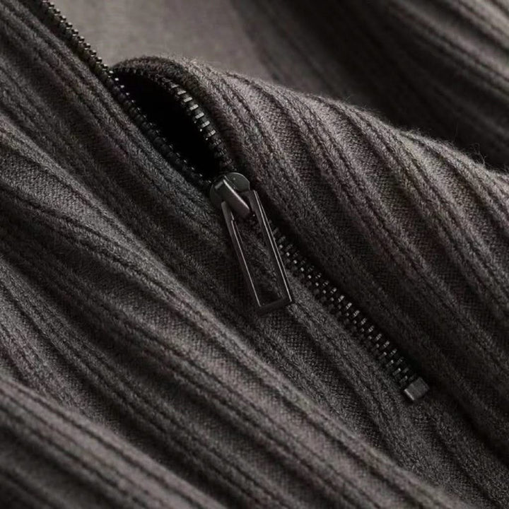 Men's ribbed knit polo shirt in a soft, lightweight cotton blend, tailored for a flattering fit.