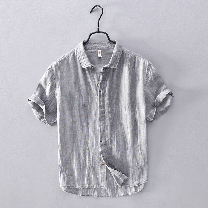 Stylish men's short-sleeve summer shirt. Lightweight, relaxed fit, button-up, perfect for casual everyday wear.