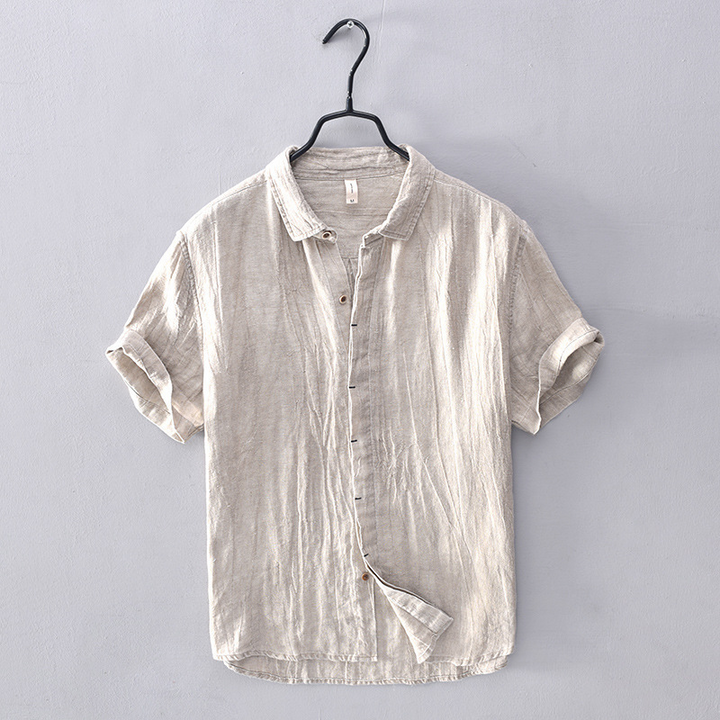 Men's short-sleeve summer shirt. Lightweight fabric, relaxed fit, button-front for warm weather and casual style.