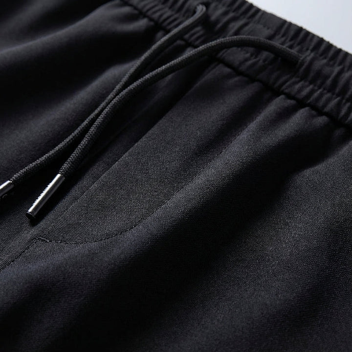 Lightweight men's casual trousers, solid color slim fit design for modern everyday wear