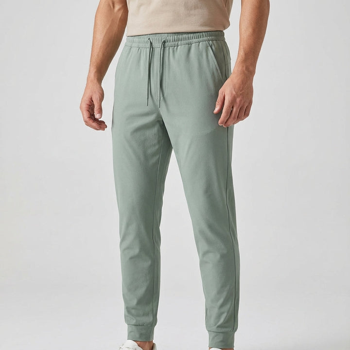 Solid color men's casual slim fit pants, ideal comfortwear for an active modern lifestyle