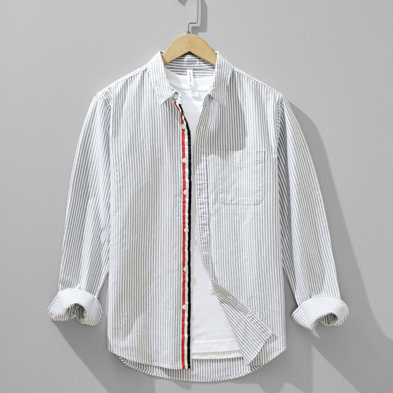 Versatile men's striped button-down shirt, lightweight and comfortable for modern casual summer wear.
