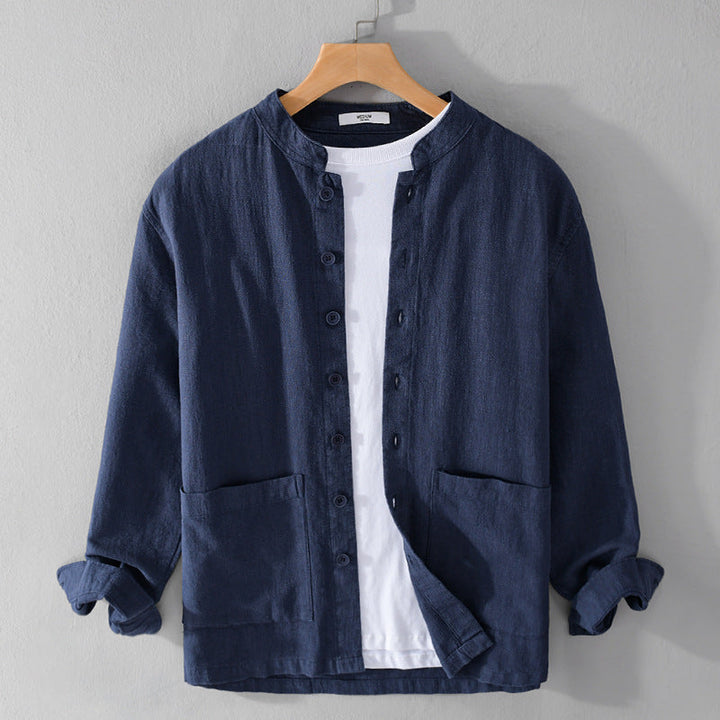 Casual men's long-sleeve button-down shirt, lightweight fabric perfect for summer layering, relaxed modern fit.