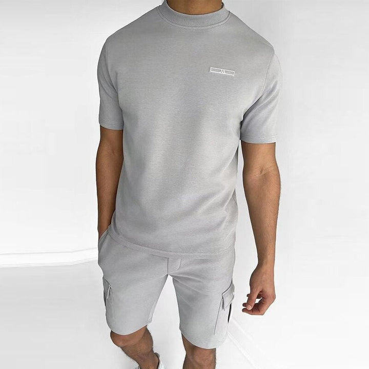 Stylish men's summer outfit, a trendy two-piece set perfect for vacation, beach resorts, and casual warm-weather fashion.