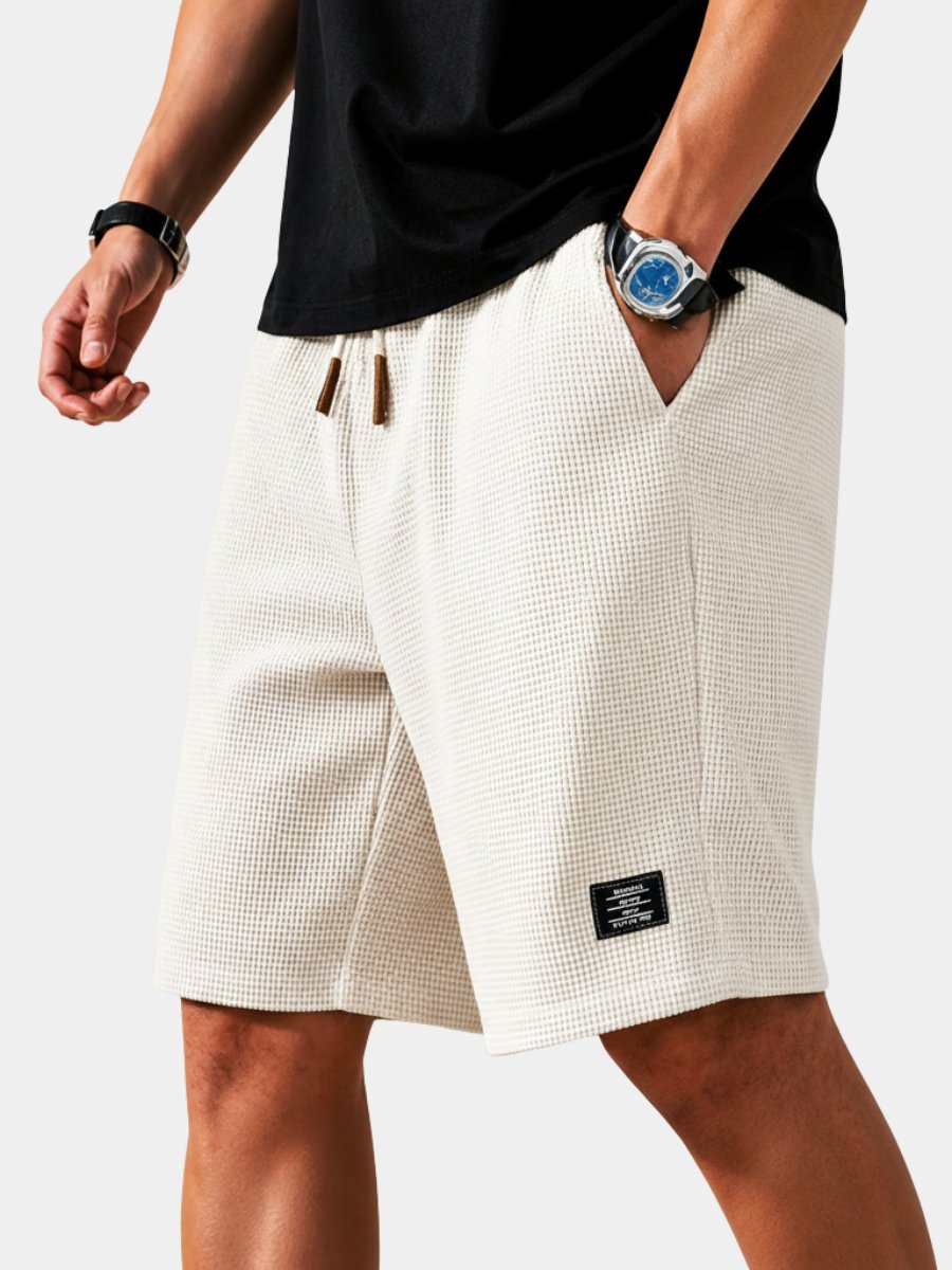 Men's lightweight summer shorts with elastic waist & drawstring for ultimate comfort.