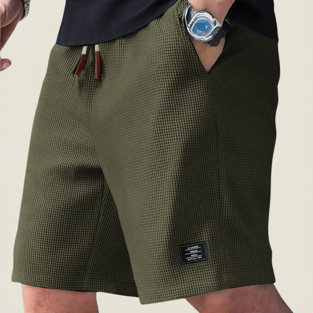 Versatile men's summer shorts for travel, sports, or relaxing; lightweight & comfortable with drawstring.