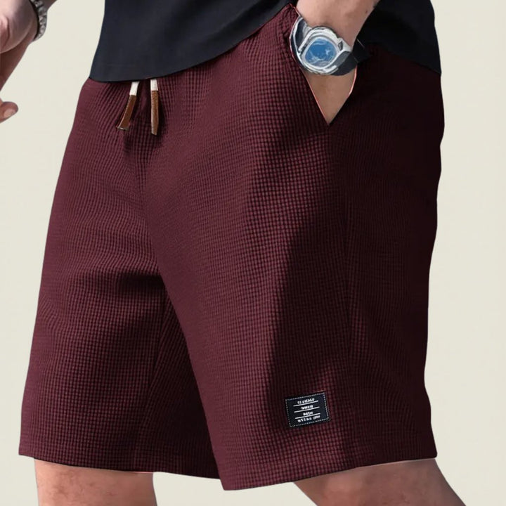 Comfortable men's summer shorts, lightweight with elastic waist & drawstring for casual everyday wear.