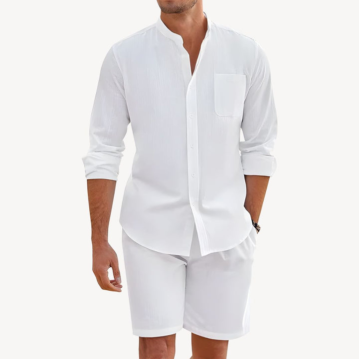 Casual men's beachwear co-ord set: short-sleeve button-up shirt and relaxed drawstring shorts, ideal for summer.