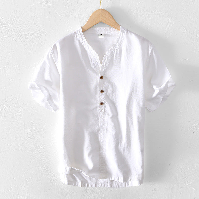 Elegant men's white short sleeve tailored shirt. Lightweight and modern design for versatile summer outfits.