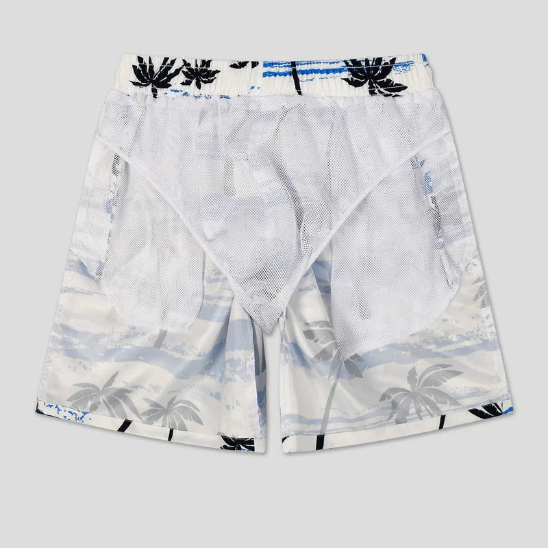 Comfortable men's summer shorts with tropical palm print for casual beach days