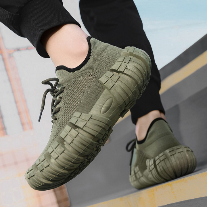 Durable sole detail of men's urban agility sneakers, designed for grip and lightweight performance.