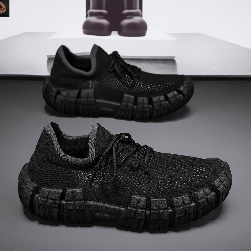 Stylish men's lightweight urban sneakers paired with casual jeans for a modern city look.