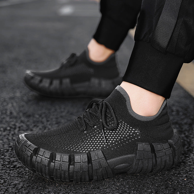 Dynamic angle of men's lightweight urban agility sneakers, showcasing ergonomic design for comfort.