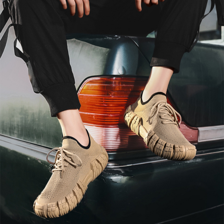 Agile men's urban sneakers, lightweight and supportive for quick movements and active city life.