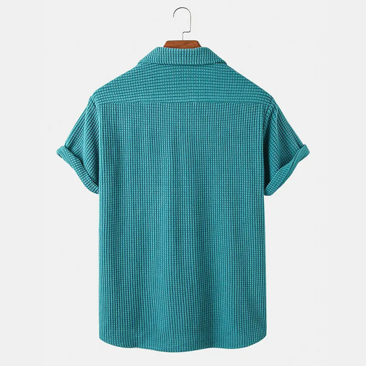 Relaxed fit men's casual waffle shirt, versatile and lightweight for everyday comfort.