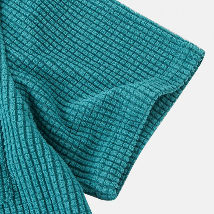 Versatile men's waffle knit button-up shirt, lightweight & breathable casual long sleeve.
