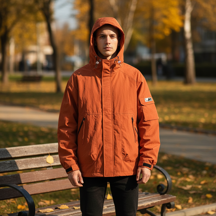 Men's lightweight water-repellent hooded windbreaker jacket in black, ideal for spring outerwear.