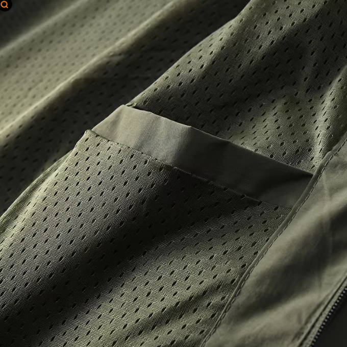 Black men's lightweight water-resistant rain jacket, essential hiking and travel gear.