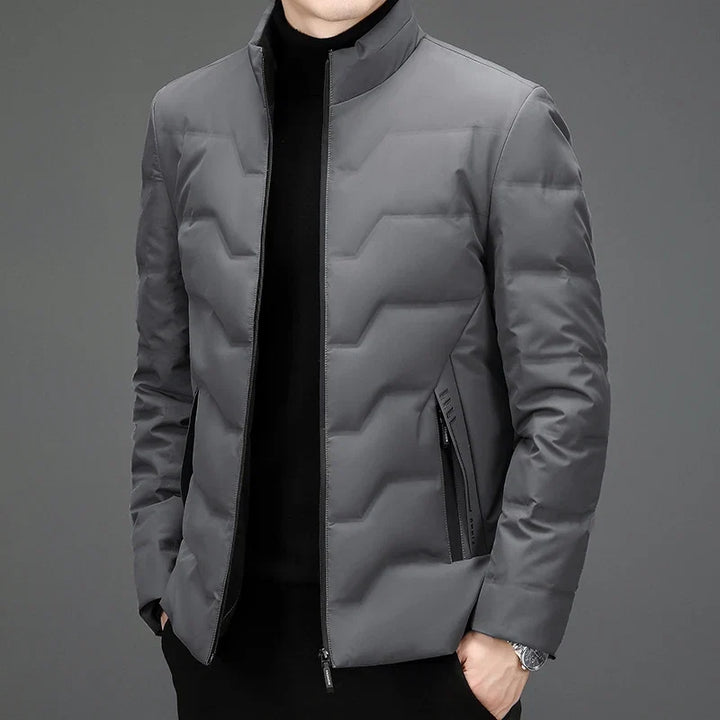 Durable men's lightweight winter outerwear. This warm, comfortable quilted jacket is perfect for daily cold weather use.