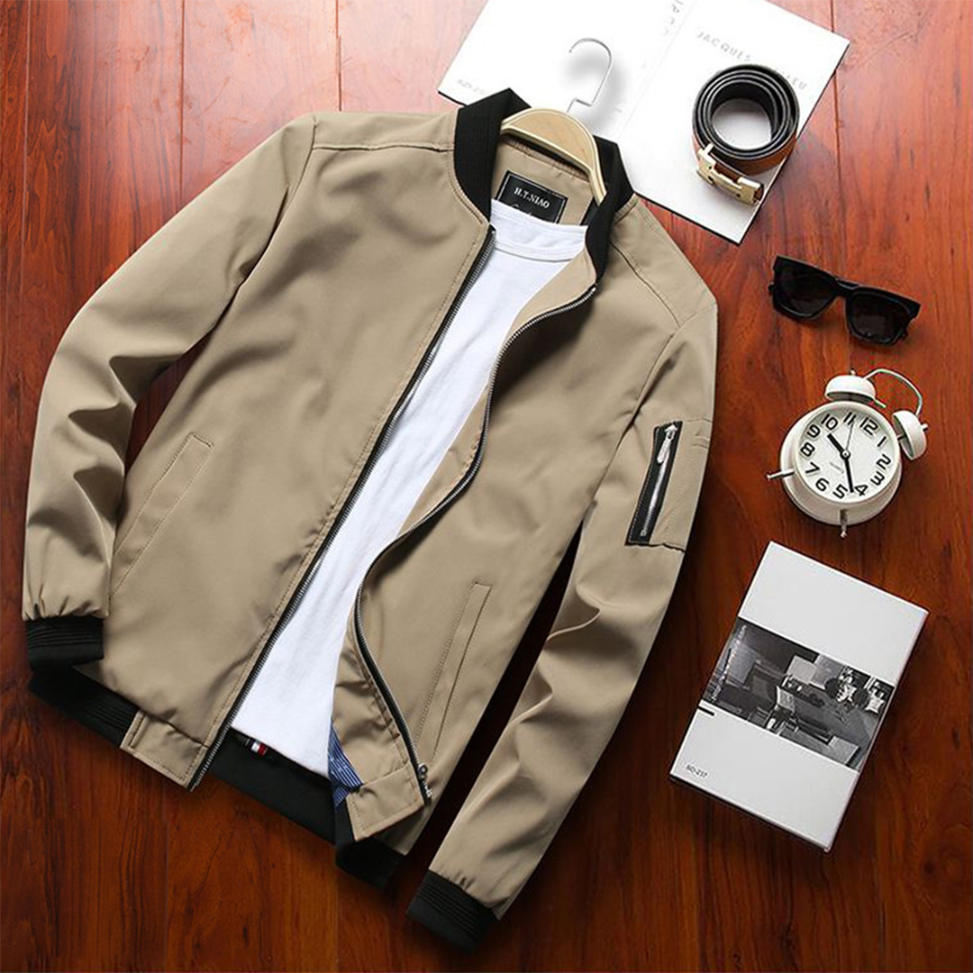 Man wearing a lightweight zip-up bomber jacket, ideal for casual summer and spring fashion.