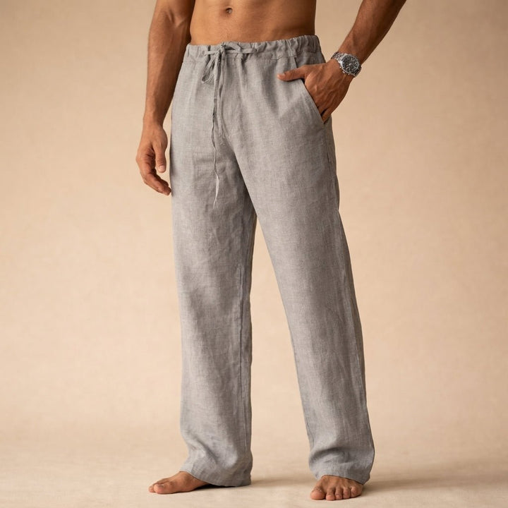 Lightweight men's linen pants with drawstring, offering a relaxed fit and breezy summer style.