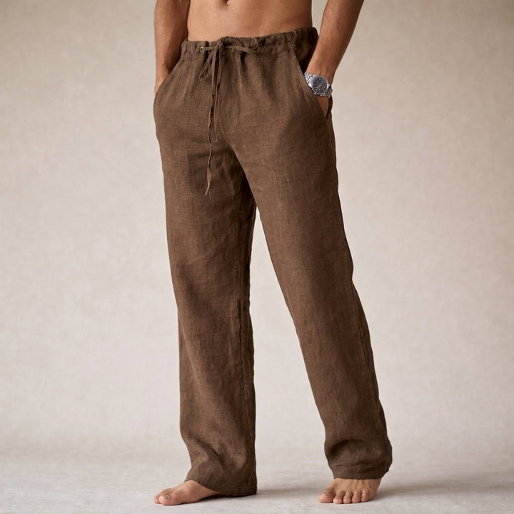 Drawstring linen pants for men, featuring a relaxed fit for comfortable, casual summer wear.